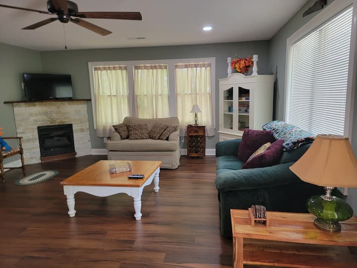 spacious living room with propane fireplace