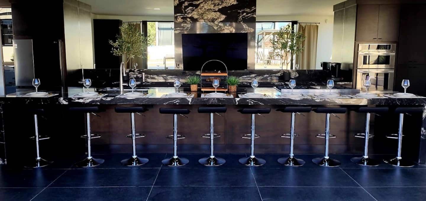 The kitchen island, with seating for 10