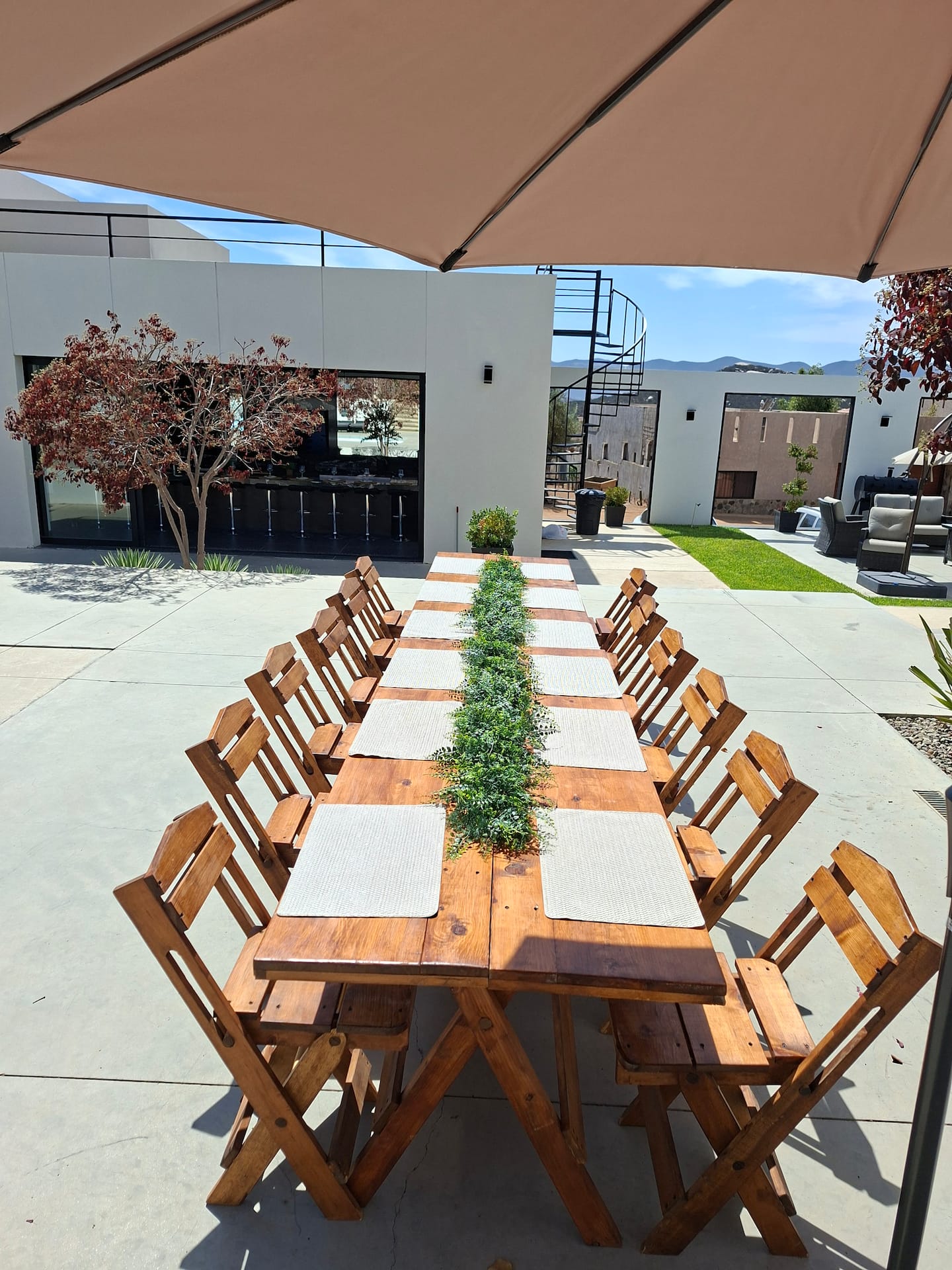 A long table set down the middle of the courtyard