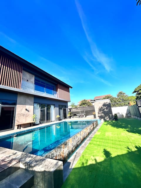 The Gray House Two-Storey Industrial Modern House
