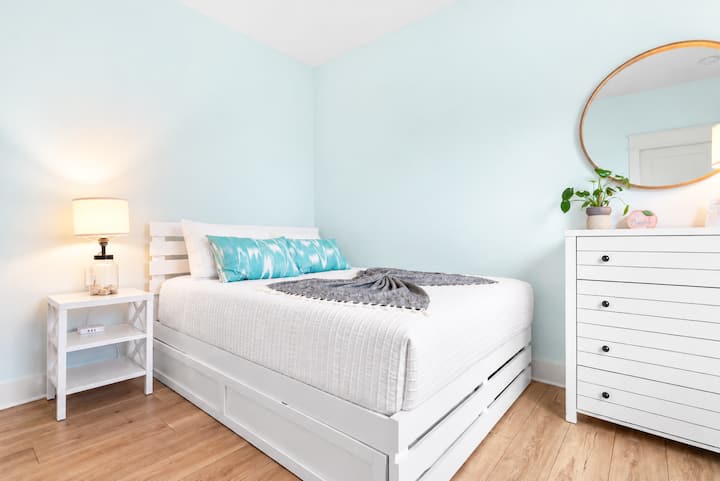 This 2nd floor room features a queen sized bed and twin trundle pull-out to sleep another guest for 3 person total occupancy in this room. Easy to move nightstand allows for easy access to trundle. Dresser available and closet available.