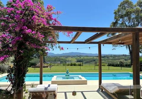 Tuscan Resort Style Home behind Byron. Epic views