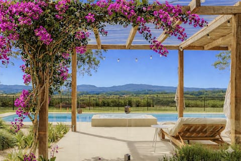 Tuscan Resort Style Home behind Byron. Epic views