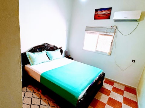 house with two air-conditioned bedrooms