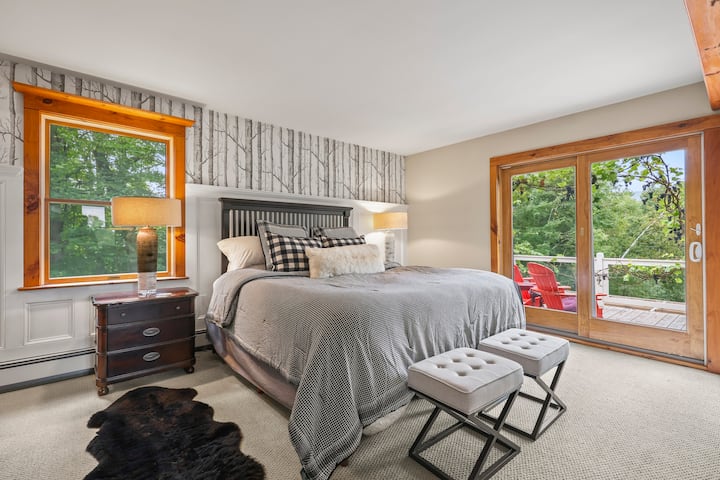 Large Primary Bedroom w/Balcony overlooking vineyard & pond