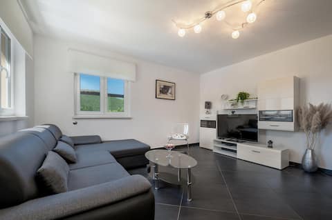 Popular Airbnb listing: Comfortable accommodation in a green oasis with a pool and garden in Breg