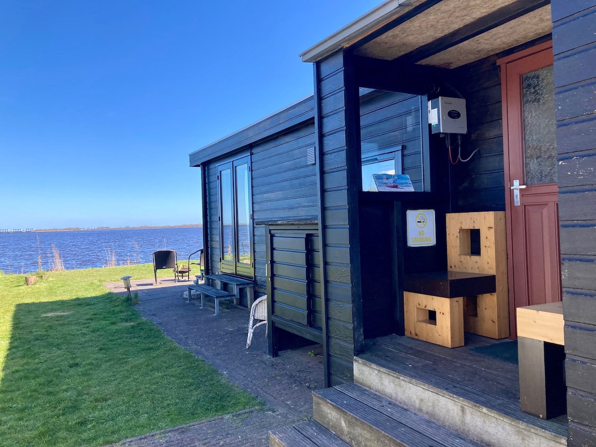 Popular Airbnb listing: Waterfront holiday home Sonnenschein 4 persons wit in Oostmahorn