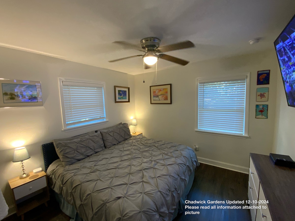 King Bed, 65” smart LG TV, dresser, luggage racks, 52” ceiling fans and original art work. 