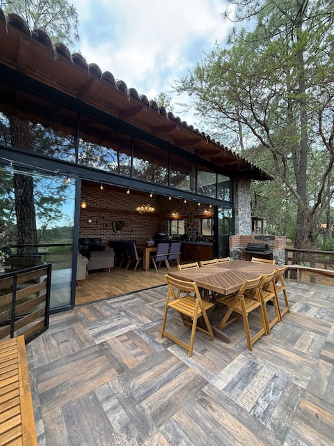 “Cabin with beautiful view facing the lake and forest”