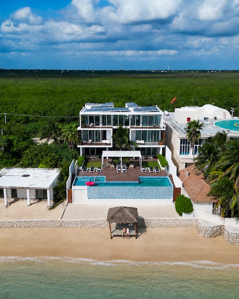 Luxury Beachfront Villa · Doors to the Sea