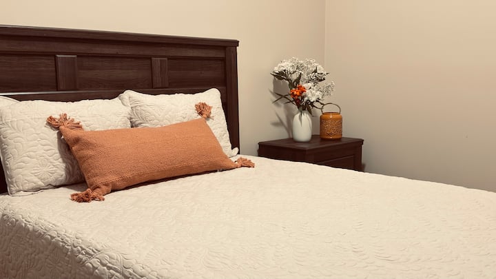 This full bedroom is warm, and inviting—great for solo guests or younger travelers. Cubs Room