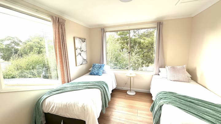 Upstair Bed Room 3 has Two Long Single beds (920mm*2030mm) accommodates 2 adults. 
Openable Window with fresh air and Mountain and garden view, 1 wireless and USB phone charging station, dimmable light.