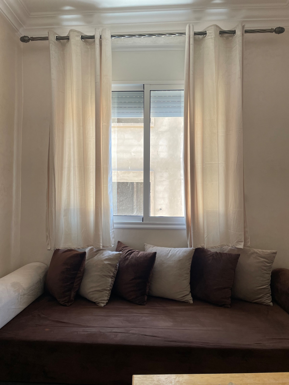 Welcome to our comfy living room! Two sofa (that can sleep 2 more Extra Guests), soft pillows, and a small table. Electric blinds on the window, TV for cable and YouTube, and a warm boho rug. Enjoy comfort and functionality in this inviting space!