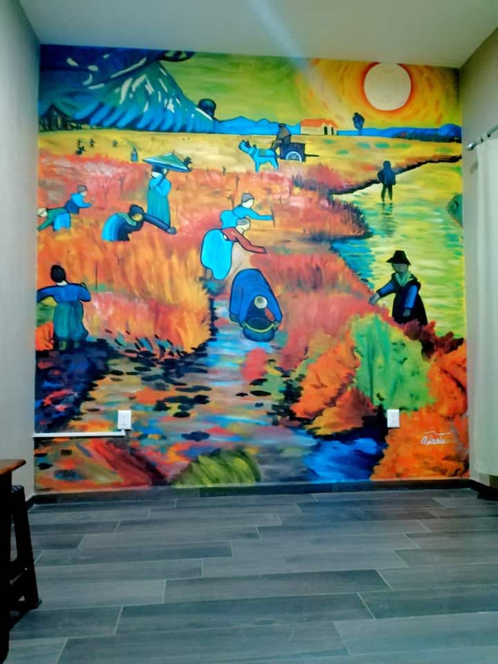 Peinture murale du vignoble rouge, réplique de l'œuvre du peintre pos impressionniste néerlandais, Vincent Willem van Gogh. 
