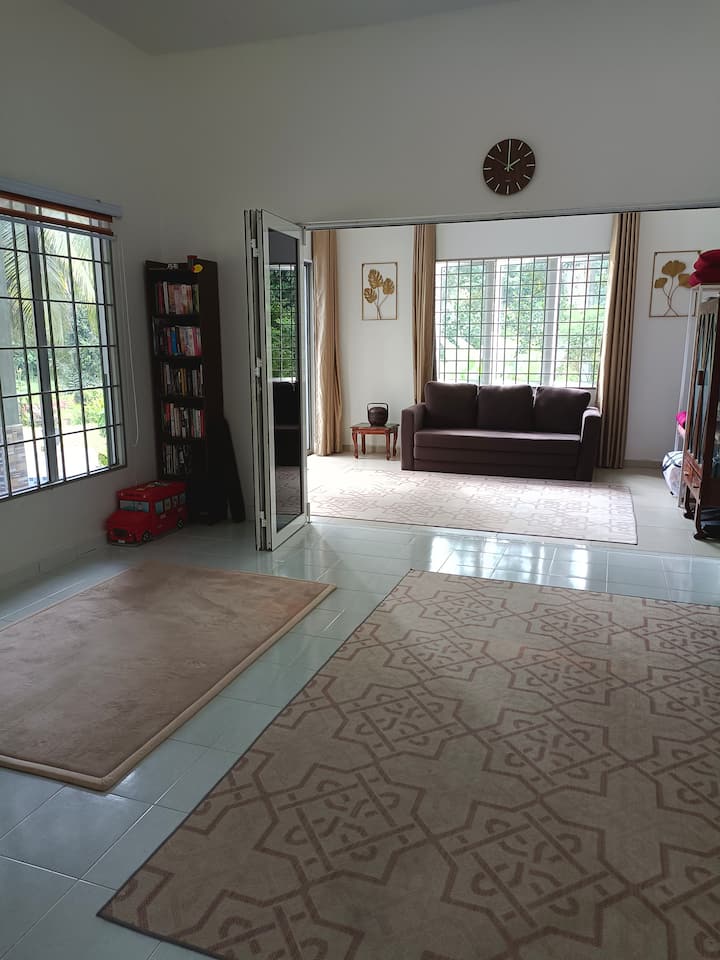 This is a convertible room — part of the living area can be turned into a bedroom. It comes with a private bathroom.