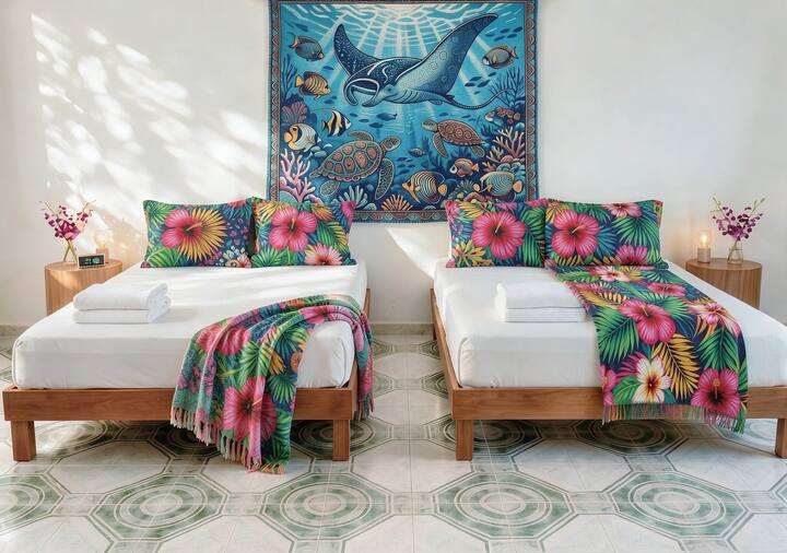 Have restful sleep in the heart of Playa! ✨ Sink into your plush matrimonial beds, wrapped in soft, fresh linens designed for total comfort. After a day of sun and adventure, your serene tropical suite awaits—so you can wake up feeling refreshed.