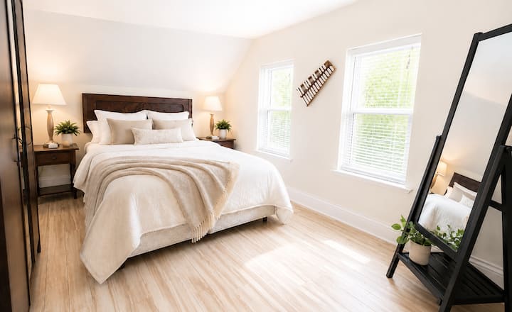 Queen bedroom with additional sofa bed for flexible family or group sleeping arrangements.