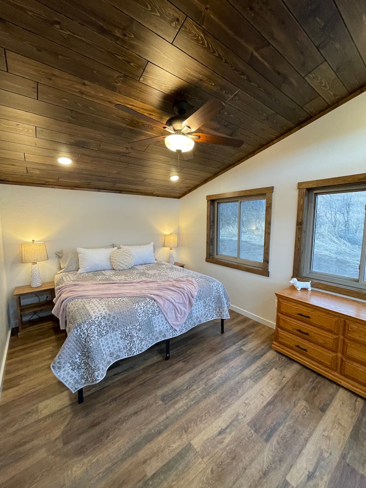 Bedroom features a king size bed