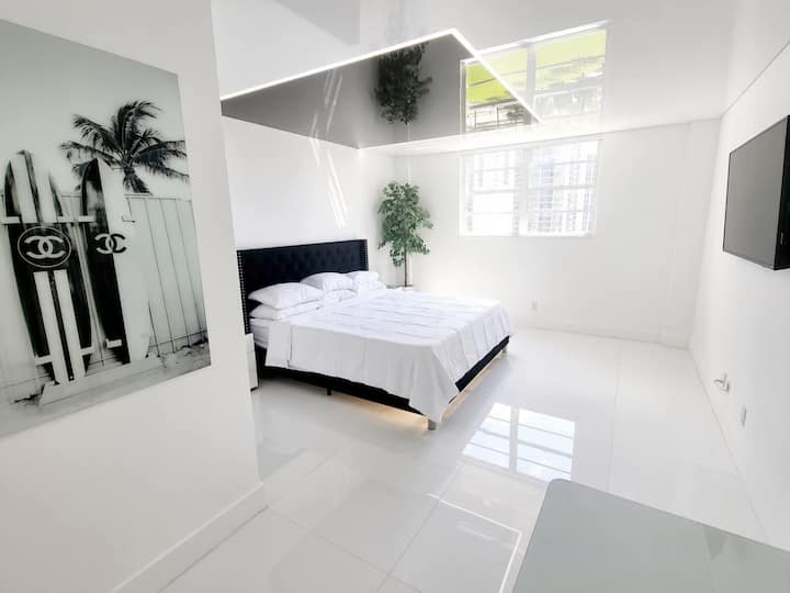 A king bed with cooling memory foam mattress which faces the Smart TV is the center-point of the primary bedroom. Ocean and city light views can be seen from the window. Total blackout shade is installed for sleeping in.