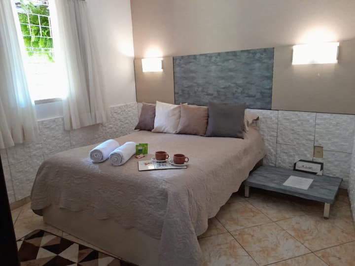 Illustrative photo: we do not serve breakfast!

Dream Suite! This Cantinho is even complete
Here you have: bedding, table and bath linens, bar soaps and shampoo/conditioner sachets, information on the city's tourist attractions :)