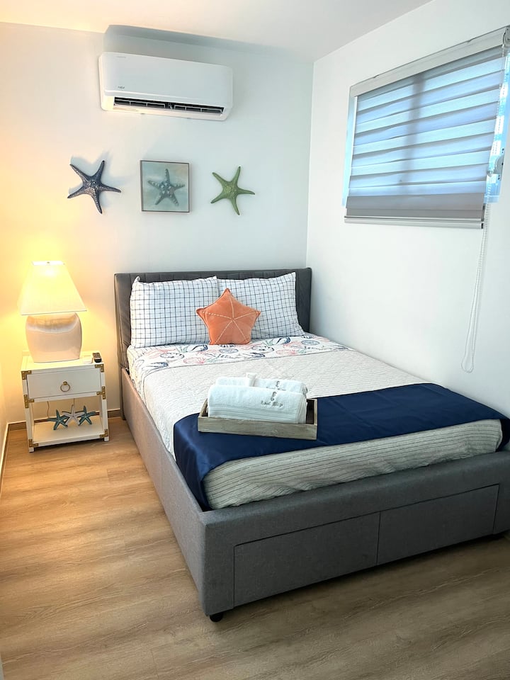 All of our rooms feature smart TVs. The bed also has drawers on the front for more storage. (This room does not have a closet, only drawers under the bed and an additional drawer unit) full bed.