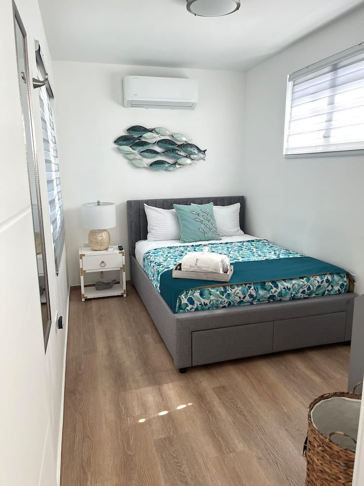 All of our rooms feature smart TVs. The bed also has drawers on the front for more storage. (This room does not have a closet, only drawers under the bed and an additional drawer unit) full bed.