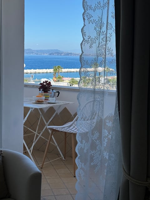 In the center and by the sea