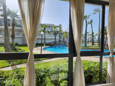 In front of the pool, 1 min walk to the beach