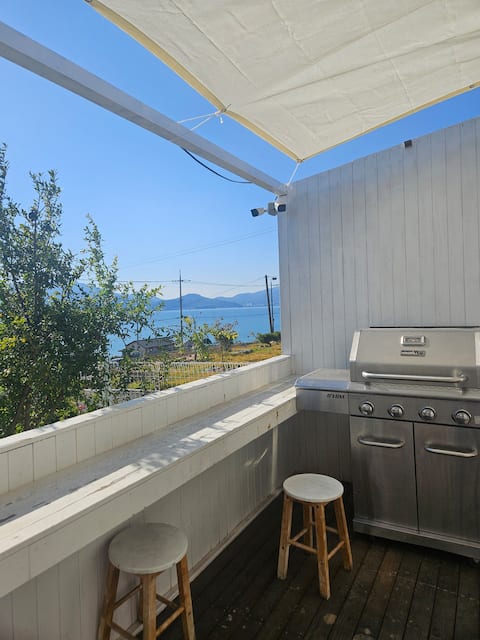 Beach House - A Place with Outdoor Hot Tub and BBQ