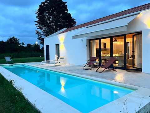 House with pool between the beach and the mountains.
