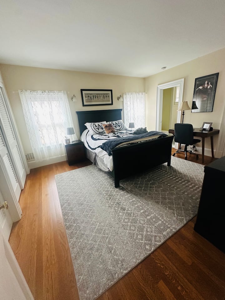 The Poplar Suite (Queen Bed) With A Desk, Dresser, Built In Cabinetry And A Full Bathroom.