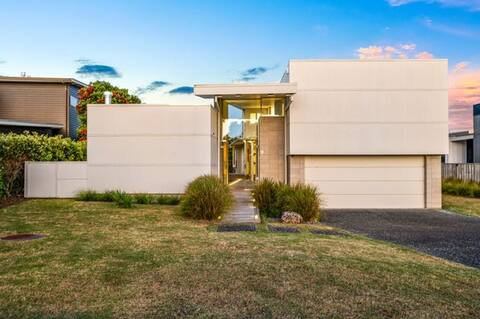 Architectural masterpiece, private beach access.