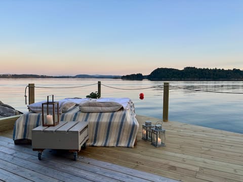 Cottage with private boathouse and shoreline