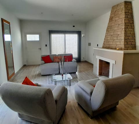 A spacious house with a large patio