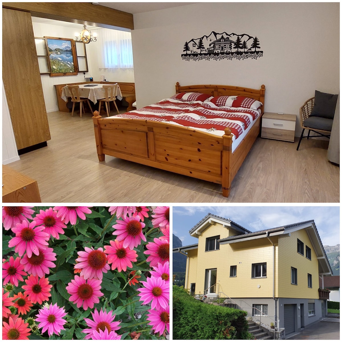 A spacious studio features a wooden bed with a patterned red and white blanket, complemented by a dining area that includes a table and chairs. Natural light fills the room through large windows, and a mountain-themed wall art enhances the cozy atmosphere.