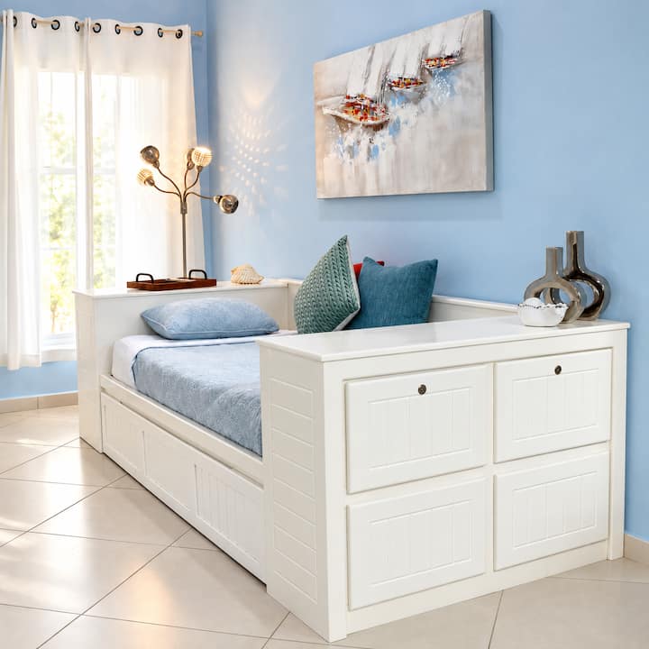 This luxury day bed doubles as a couch maximizing space options in this two bedroom unit. This gives you another person sleeping option to bring your whole family of 5.
