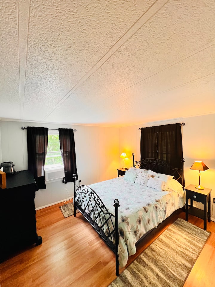 Bedroom #1- Queen Bed, black out curtains, and air conditioning