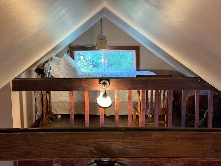 Twin bed is located in a small loft. There is a ladder that provides access to this sleeping area.