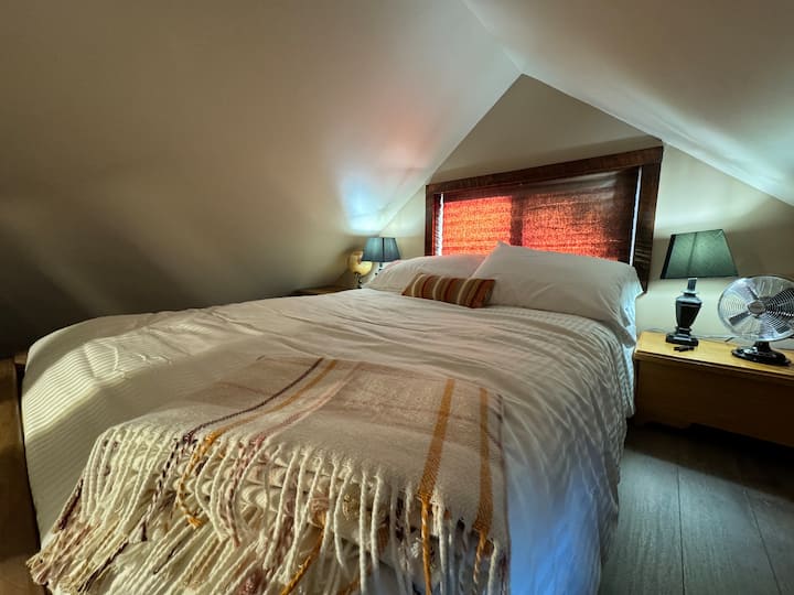 Full bed is located up in a small loft. Those who choose to sleep in this bed must use a ladder to access this sleeping area.