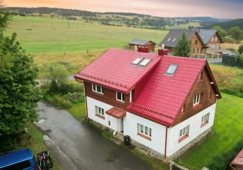 Cottage at the end of the road and intersection of hiking trails