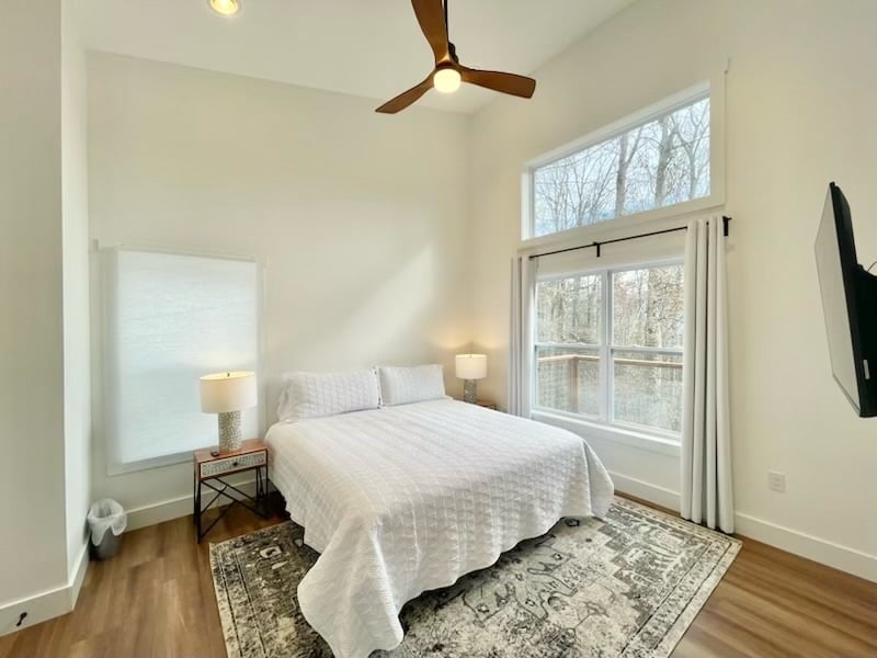 Primary suite with king bed, 50” HDTV, full bath and laundry room. View the stars from bed on a clear night. 