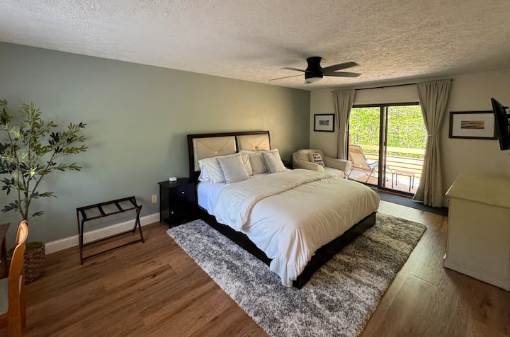 Upstairs Bedroom - 1 King Bed, Private Balcony, En-Suite Bathroom, Office Desk, Smart TV, and Closet
