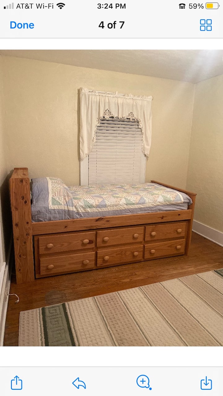 This bed has a twin trundle bed under it. Extra linen for it can be found in the drawers