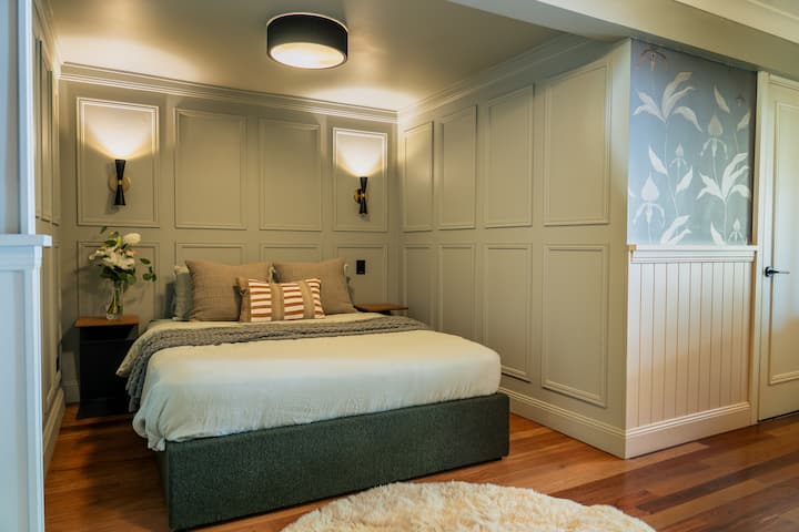 Bedroom 2 with Queen bed, fan and wardrobe
