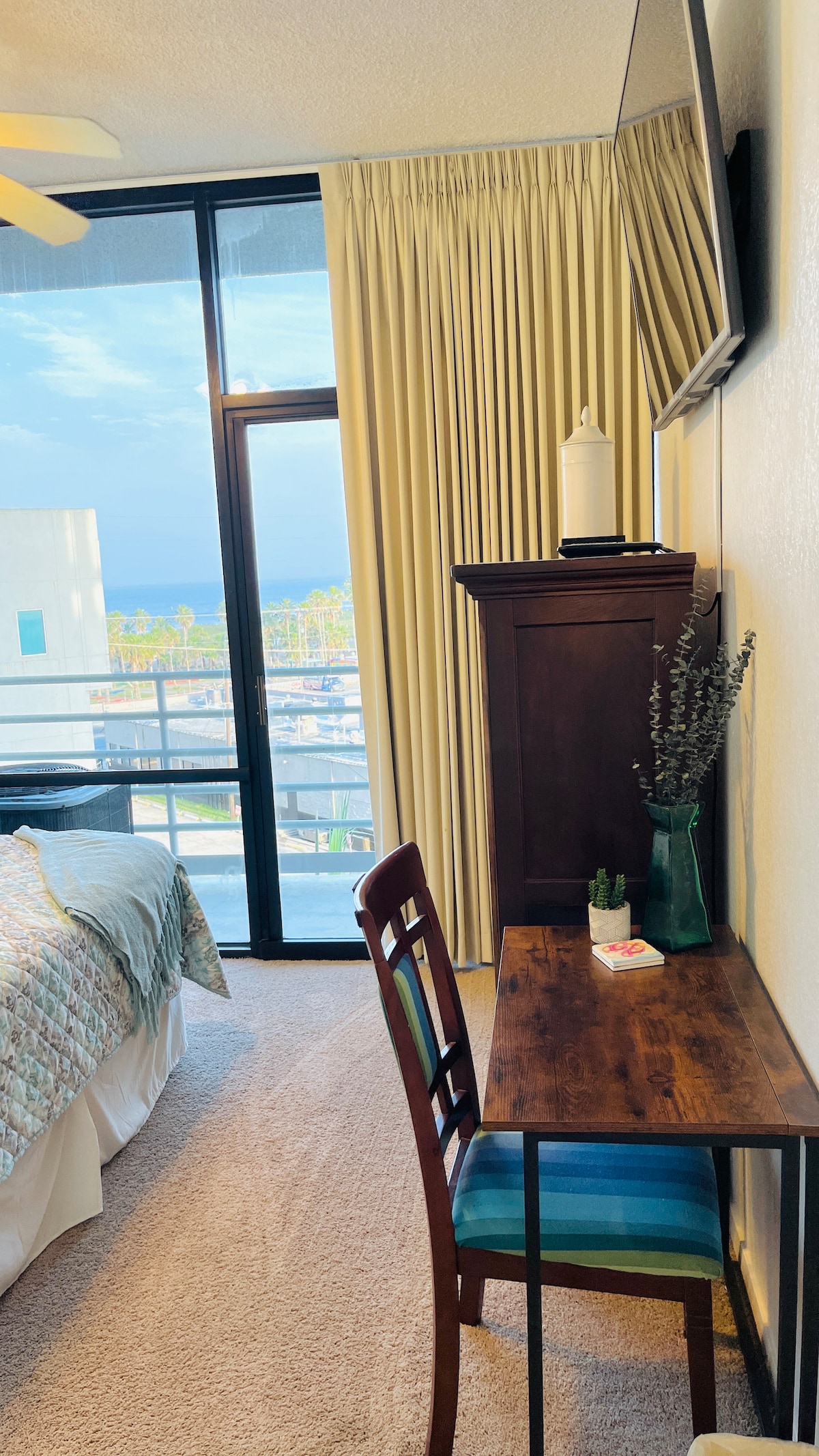  This room has a dual purpose, bedroom with a Queen size bed and office area.