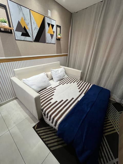 Top performing Airbnb: Suite with balcony 700 meters from Aterro Praia de Iracema in Fortaleza