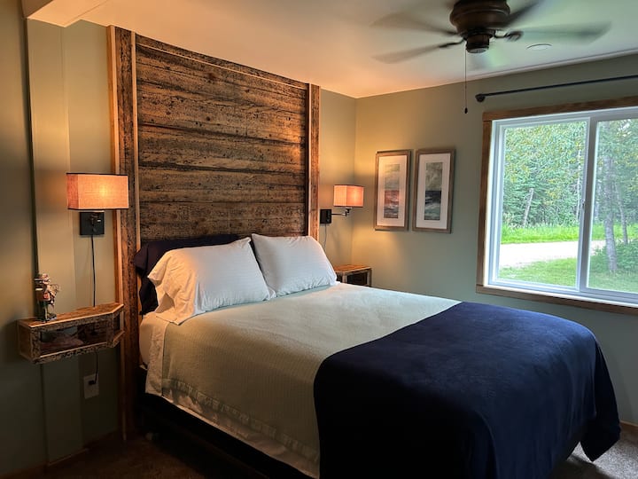 Primary Bedroom with adjoining screen-porch facing lake