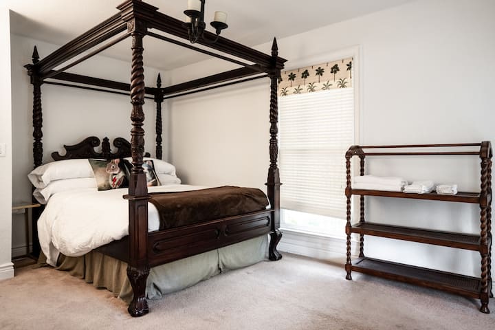 Queen bed fit for a queen, main floor