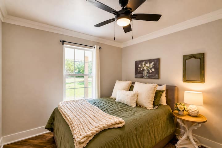 Bedroom Retreat: Bright space with chic decor, queen bed, and serene views for restful nights!