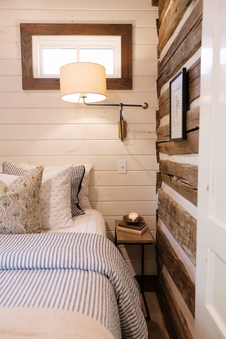 This cozy bedroom offers the perfect retreat to unwind after a day of exploring and relaxing at the cabin.
